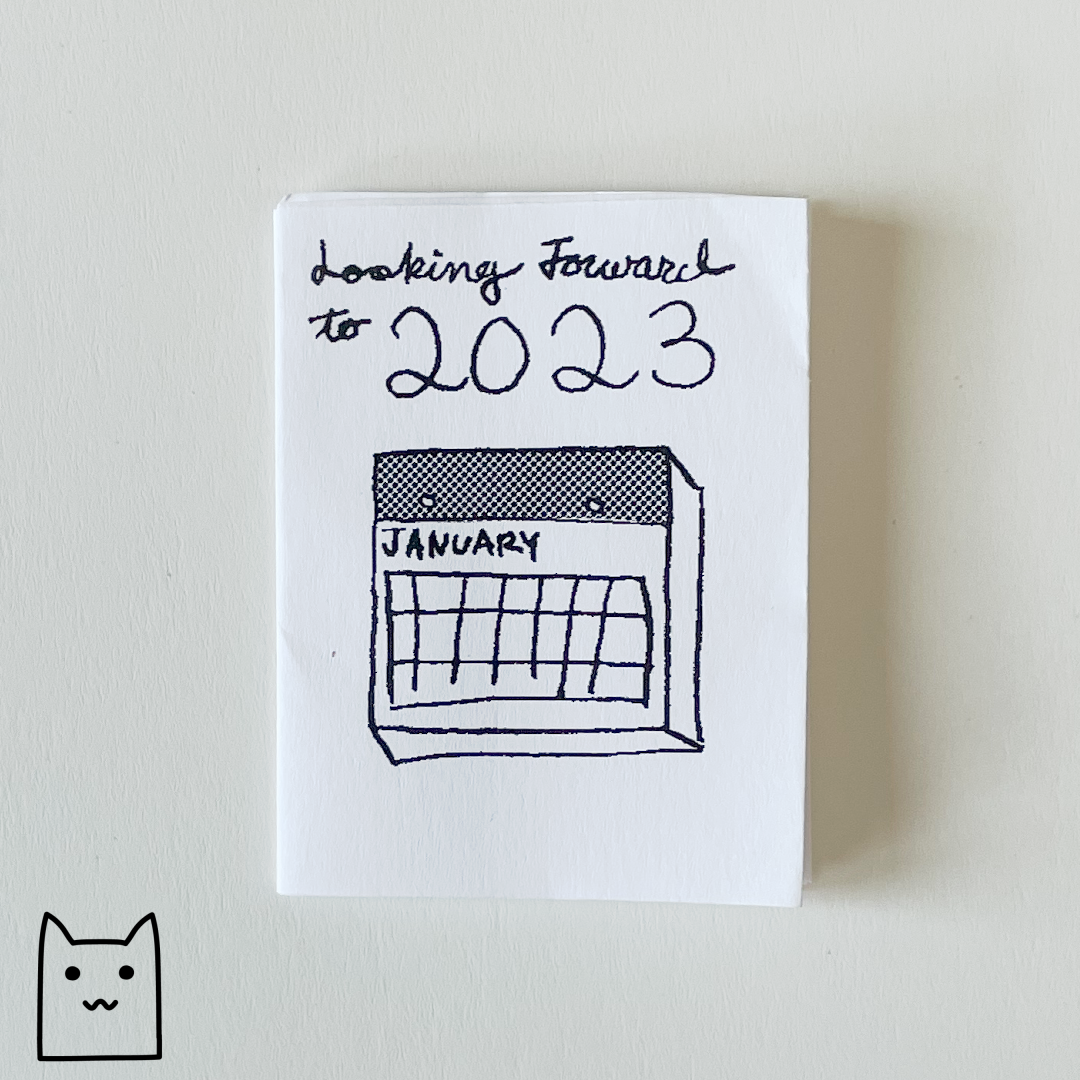 A photo of the cover of Looking Forward to 2023, a zine by Dana Amundsen.