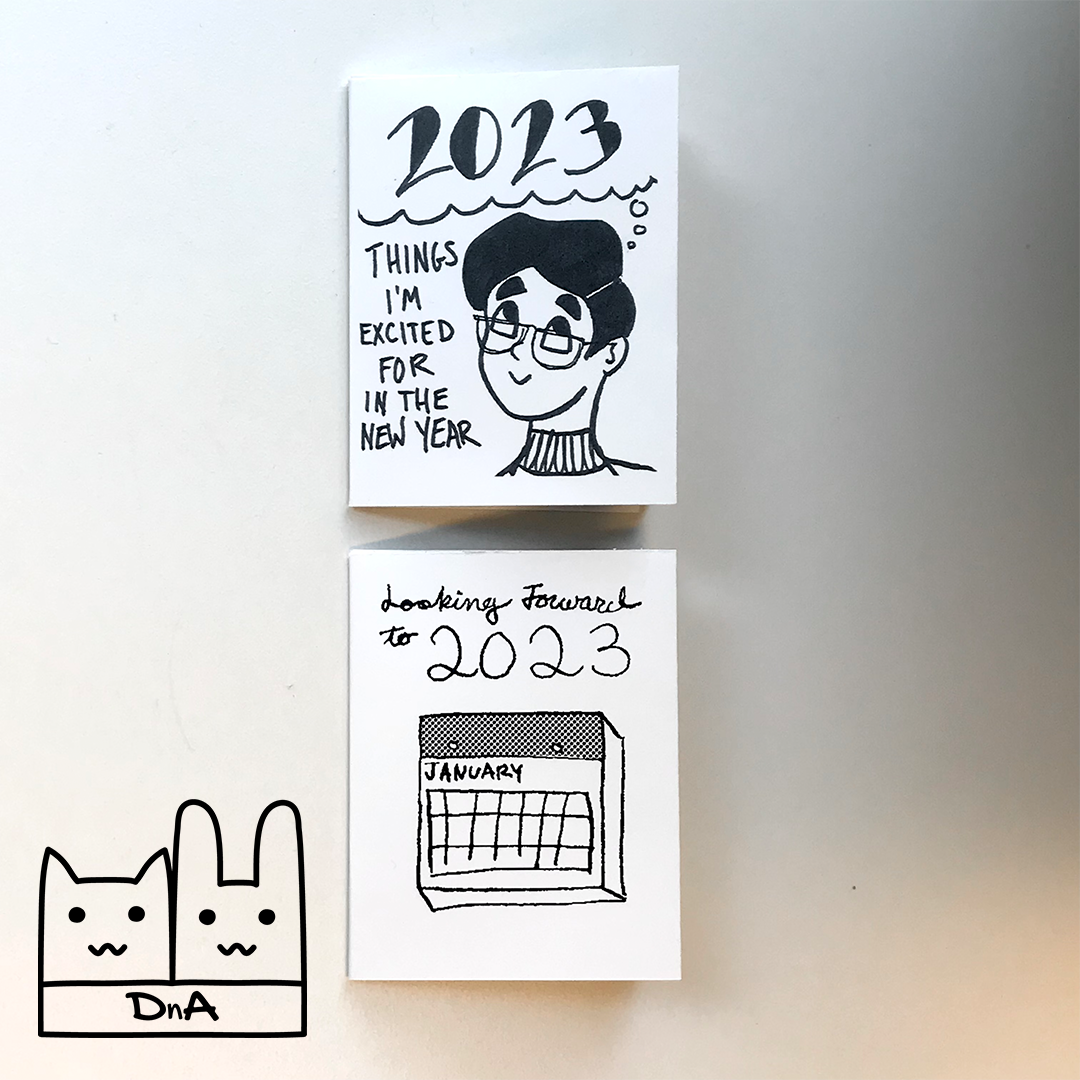 A photo of two mini zines by Dana and Alex.