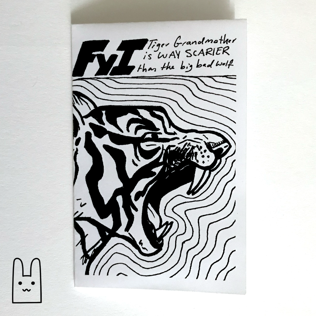 A photo of the front cover of FYI Fairy Tales, Volume 3: Tiger Grandmother, a zine by Alex O'Keefe